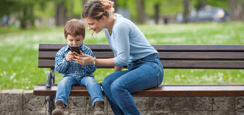 mother kids on phone 847 x 400 Double width | App-solutely brilliant – our mobile app has been updated!