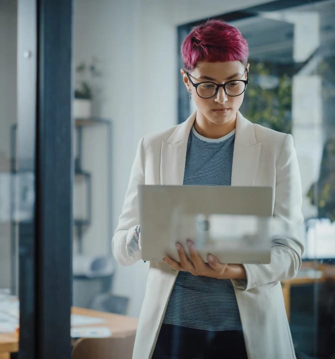 Person holding laptop