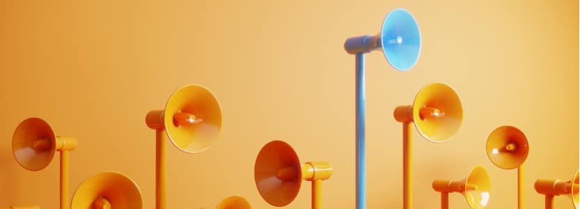 blue colored megaphone standing out from the | SME success: three tips for marketing your business