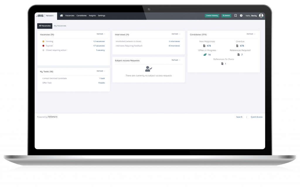 Open laptop with NEtworx Recruitment software dashboard loaded on screen