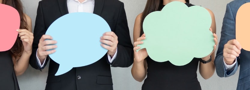 image of people holding cut-out thought and speech bubbles