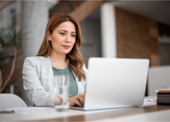 woman working on laptop | IRIS Accounts Production