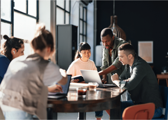 People working around table