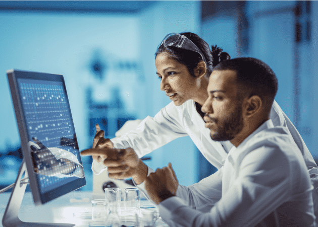 Healthcare workers looking at computer
