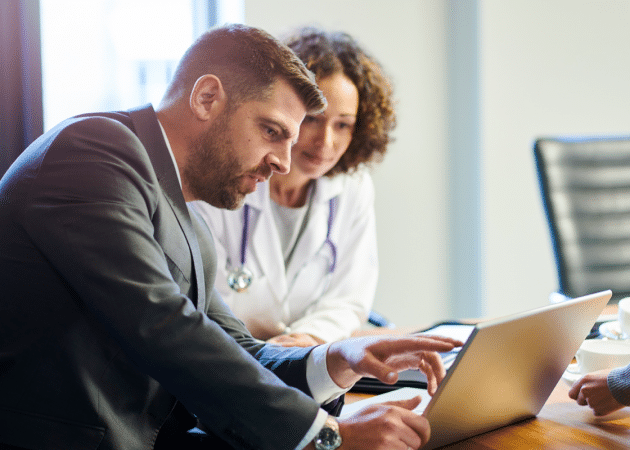 Healthcare workers on computer