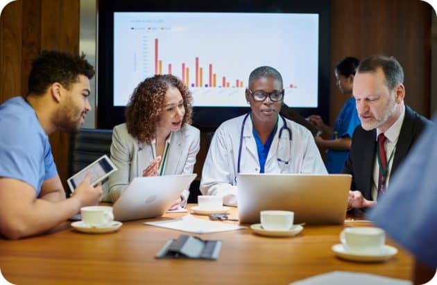 Doctors sitting around table