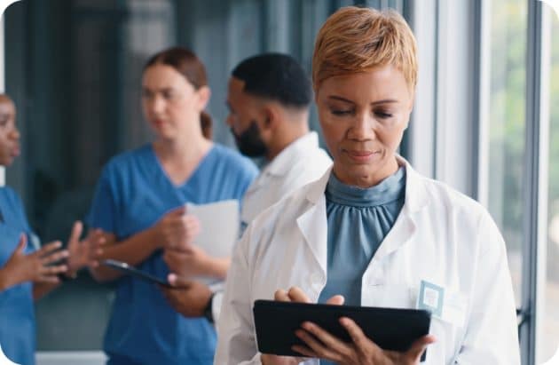 Doctor looking at ipad
