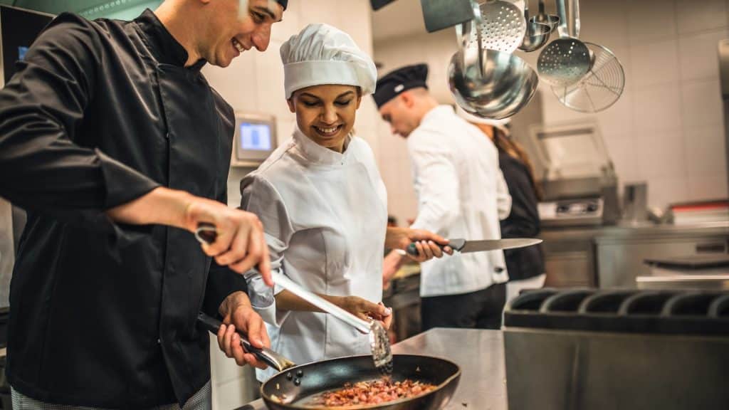 the team of cooks backs in the work in the modern kitchen.jpg s1024x1024wisk20c3qWPH4e9NdJ9Ii t8ezHVLsH X Lyt4LbNSpDmUrx7Y | Three ways hospitality businesses can improve recruitment with software